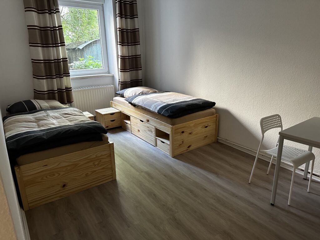Schlafzimmer im Apartment 1 für bis zu 10 Personen in der Schillstraße in Kassel